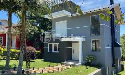 Casa em condomínio fechado com 3 quartos à venda na Estrada Capitão Gentil Machado de Godoy, 4500, Vila Elsa, Viamão, 200 m2 por R$ 1.250.000