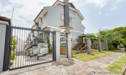 Casa em condomínio fechado com 3 quartos à venda na Rua Doutor Arnaldo da Silva Ferreira, 410, Jardim Isabel, Porto Alegre, 223 m2 por R$ 794.200