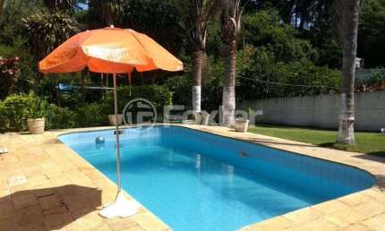 Casa com 3 quartos à venda na Praça Apiaca, 136, Espírito Santo, Porto Alegre, 106 m2 por R$ 960.000