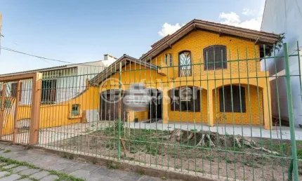 Casa com 4 quartos à venda na Rua Alfredo Silveira Dias, 169, Nonoai, Porto Alegre, 240 m2 por R$ 1.500.000