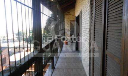 Casa com 3 quartos à venda na Avenida Capivari, 1104, Cristal, Porto Alegre, 270 m2 por R$ 647.000