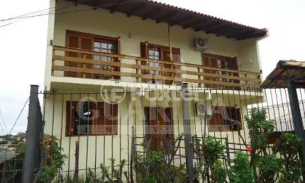Casa com 3 quartos à venda na Avenida Natal, 241, Medianeira, Porto Alegre por R$ 585.000