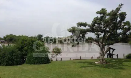 Casa com 2 quartos à venda na rua joão inácio da silveira, 779, arquipélago, porto alegre, 180 m2 por r$ 2.100.000