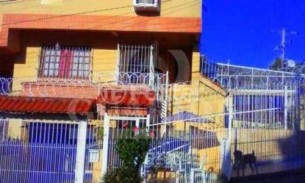 Casa com 3 quartos à venda na Rua Professor Joaquim Louzada, 104, Camaquã, Porto Alegre, 226 m2 por R$ 599.000