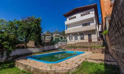 Casa com 4 quartos à venda na Praça São Caetano, 84, Teresópolis, Porto Alegre, 432 m2 por R$ 1.590.000