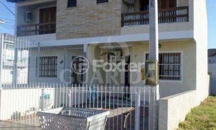 Casa com 3 quartos à venda na Rua Embira, 98, Hípica, Porto Alegre por R$ 498.000