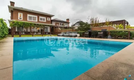 Casa em condomínio fechado com 4 quartos à venda na Avenida Juca Batista, 9000, Belém Novo, Porto Alegre, 330 m2 por R$ 2.862.000