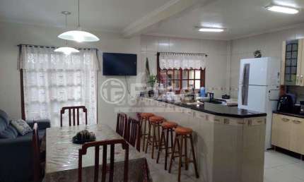 Casa em condomínio fechado com 3 quartos à venda na Estrada Cristiano Kraemer, 3341, Vila Nova, Porto Alegre, 243 m2 por R$ 350.000
