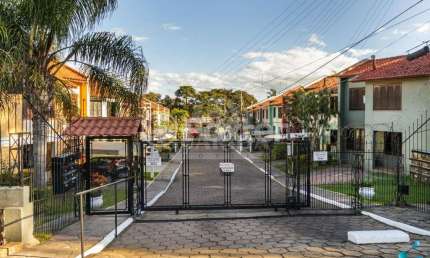 Casa em condomínio fechado com 3 quartos à venda na Avenida Juca Batista, 4075, Cavalhada, Porto Alegre, 99 m2 por R$ 390.000