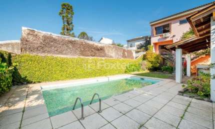 Casa com 3 quartos à venda na Rua Otávio Faria, 284, Teresópolis, Porto Alegre, 484 m2 por R$ 895.000