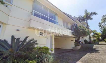 Casa em condomínio fechado com 3 quartos à venda na Rua Doutor Arnaldo da Silva Ferreira, 465, Jardim Isabel, Porto Alegre, 217 m2 por R$ 1.399.000