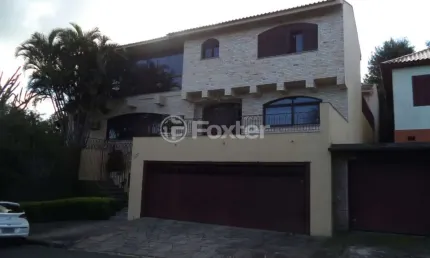 Casa com 4 quartos à venda na Rua dos Guenoas, 501, Guarujá, Porto Alegre, 720 m2 por R$ 1.600.000