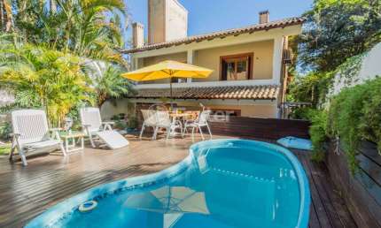 Casa com 4 quartos à venda na Avenida General Barreto Viana, 595, Chácara das Pedras, Porto Alegre, 575 m2 por R$ 2.500.000