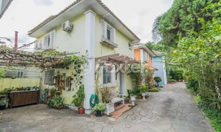 Casa em condomínio fechado com 3 quartos à venda na rua landel de moura, 2541, tristeza, porto alegre, 104 m2 por r$ 660.000