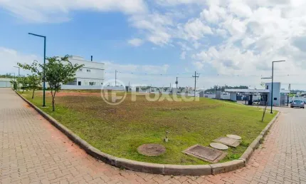 Terreno em condomínio fechado à venda na Rua Manuel Bandeira, 450, Marechal Rondon, Canoas, 418 m2 por R$ 1.060.000