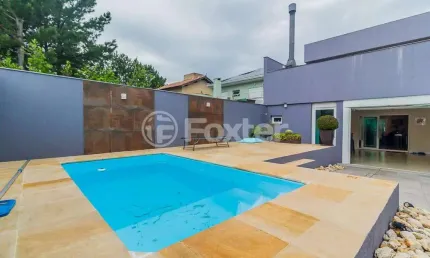 Casa em condomínio fechado com 3 quartos à venda na Rua Caroba, 385, São Lucas, Viamão, 232 m2 por R$ 1.200.000