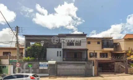Casa com 4 quartos à venda na Rua Dona Adda Mascarenhas de Moraes, 886, Jardim Itu Sabará, Porto Alegre, 482 m2 por R$ 1.350.500