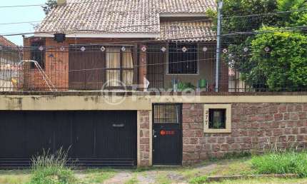 Casa com 3 quartos à venda na Avenida Deputado Aramy Silva, 277, Santa Tereza, Porto Alegre, 154 m2 por R$ 945.000