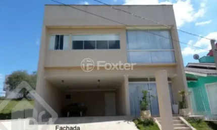 Casa em condomínio fechado com 4 quartos à venda na Rua Arahy Borges Ortiz, 30, Mário Quintana, Porto Alegre, 204 m2 por R$ 750.000