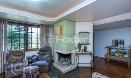 Casa com 4 quartos à venda na Rua Professor Antônio José Remião, 295, Espírito Santo, Porto Alegre, 318 m2 por R$ 1.100.000