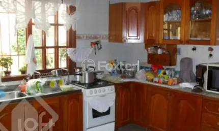 Casa com 3 quartos à venda na rua dona zulmira, 158, cavalhada, porto alegre, 220 m2 por r$ 585.000