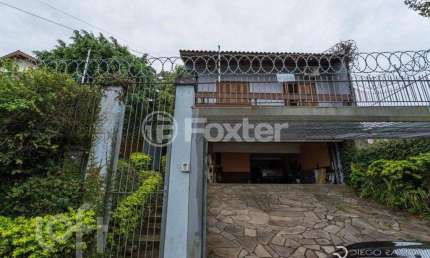 Casa com 4 quartos à venda na Rua Gilberto Laste, 37, Santa Tereza, Porto Alegre, 390 m2 por R$ 1.480.000