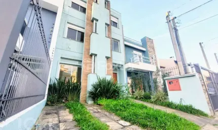Casa com 5 quartos à venda na Rua Roberto Santini, 123, Hípica, Porto Alegre, 195 m2 por R$ 748.900