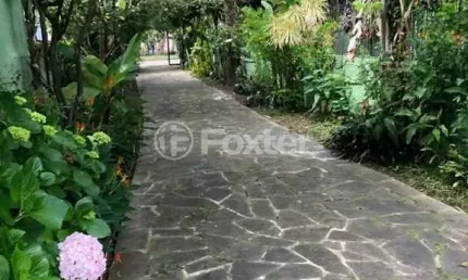 Casa com 3 quartos à venda na avenida ararangua, 151, guarujá, porto alegre, 236 m2 por r$ 600.000