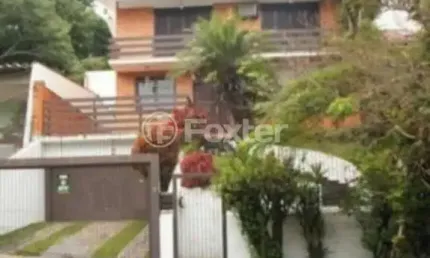 Casa com 3 quartos à venda na Avenida Fábio Araújo Santos, 1650, Nonoai, Porto Alegre, 279 m2 por R$ 957.500