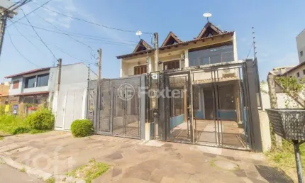 Casa com 3 quartos à venda na Rua Izar Faria Correa Sant'Anna, 41, Hípica, Porto Alegre, 125 m2 por R$ 450.000
