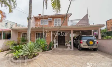 Casa com 3 quartos à venda na Avenida Capivari, 391, Cristal, Porto Alegre, 300 m2 por R$ 1.590.000