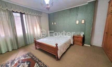 Casa com 4 quartos à venda na Rua Doutor Alberto Albertini, 329, São Sebastião, Porto Alegre, 268 m2 por R$ 933.000