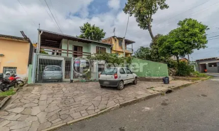 Casa com 6 quartos à venda na Avenida Paulo Pontes, 648, Cavalhada, Porto Alegre, 247 m2 por R$ 550.905
