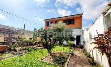 Casa com 3 quartos à venda na Rua Vinte e Cinco de Julho, 55, Santa Maria Goretti, Porto Alegre, 292 m2 por R$ 790.000