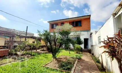 Casa com 3 quartos à venda na Rua Vinte e Cinco de Julho, 55, Santa Maria Goretti, Porto Alegre, 292 m2 por R$ 790.000