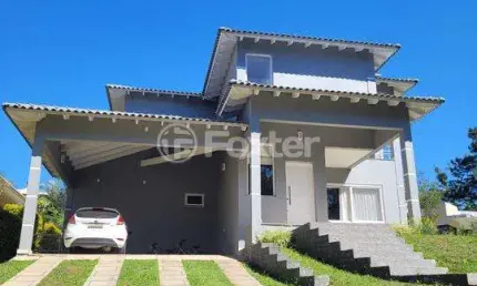Casa em condomínio fechado com 3 quartos à venda na Estrada Capitão Gentil Machado de Godoy, 4500, Vila Elsa, Viamão, 720 m2 por R$ 1.450.000