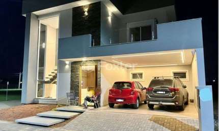Casa em condomínio fechado com 3 quartos à venda na Rua Frederico Warstat, 695, Sans Souci, Eldorado do Sul, 234 m2 por R$ 1.400.000