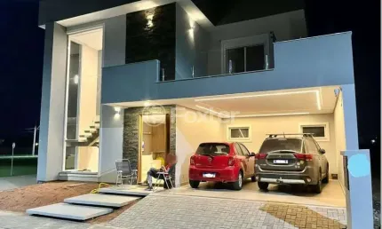 Casa em condomínio fechado com 3 quartos à venda na Rua Frederico Warstat, 695, Sans Souci, Eldorado do Sul, 234 m2 por R$ 1.400.000