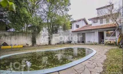 Casa com 4 quartos à venda na Rua Manoel Leão, 45, Pedra Redonda, Porto Alegre, 203 m2 por R$ 600.000