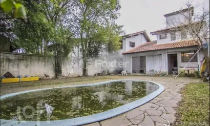 Casa com 4 quartos à venda na Rua Manoel Leão, 45, Pedra Redonda, Porto Alegre, 203 m2 por R$ 600.000