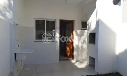 Casa com 3 quartos à venda na Rua Itacyr Rossi, 191, Guarujá, Porto Alegre, 126 m2 por R$ 500.000