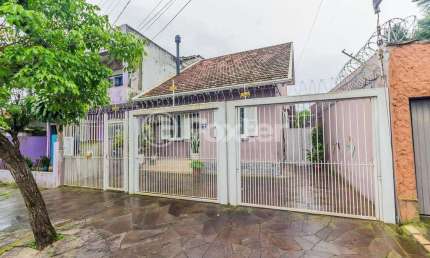 Casa com 4 quartos à venda na Rua Candiota, 80, Passo da Areia, Porto Alegre, 161 m2 por R$ 680.000