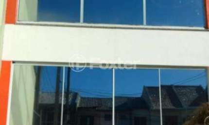 Casa em condomínio fechado com 2 quartos à venda na Rua Heitor Kramer, 415, Guarujá, Porto Alegre, 102 m2 por R$ 427.500