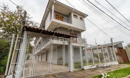 Casa em condomínio fechado com 3 quartos à venda na Rua Jamil Antônio José, 46, Nonoai, Porto Alegre, 145 m2 por R$ 555.000