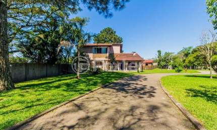 Casa com 4 quartos à venda na Rua Portela, 40, Florescente, Viamão, 358 m2 por R$ 949.000