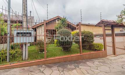 Casa com 4 quartos à venda na Rua Doutor Mário Totta, 2901, Tristeza, Porto Alegre, 305 m2 por R$ 650.500