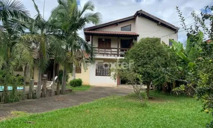 Casa com 3 quartos à venda na Rua Barão de Itaqui, 125, Primavera, Novo Hamburgo, 180 m2 por R$ 1.000.000