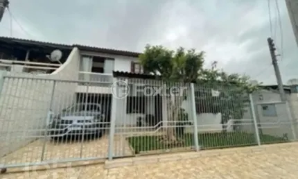 Casa com 5 quartos à venda na Quadra GG Dois, 25, Guajuviras, Canoas, 200 m2 por R$ 390.000