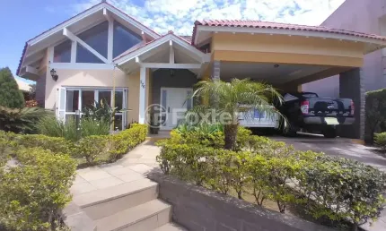 Casa em condomínio fechado com 3 quartos à venda na Estrada Capitão Gentil Machado de Godoy, 4500, Vila Elsa, Viamão, 720 m2 por R$ 1.400.000