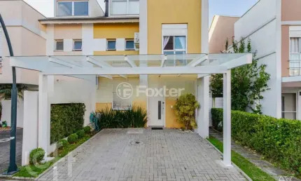 Casa em condomínio fechado com 3 quartos à venda na Avenida Açucena, 550, Estância Velha, Canoas, 180 m2 por R$ 1.150.000